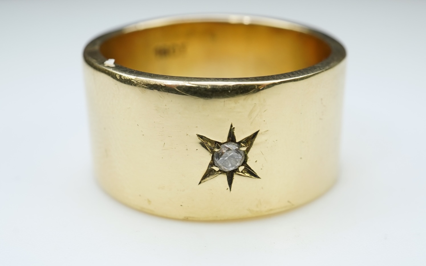 A gold and diamond ring